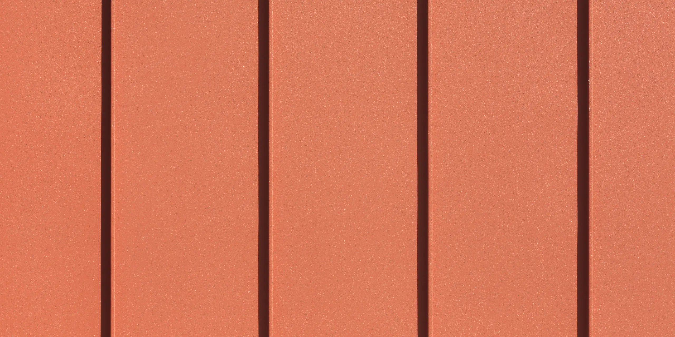 Système de toiture et de façade PREFALZ en rouge tuile P.10 sur le presbytère de Chalampé