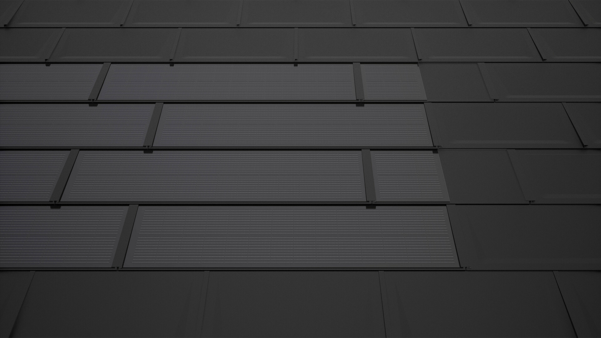 PREFA Solardachplatten in Schwarz mit Ergänzungsplatten. Diese sorgen für eine rechteckige Modulfläche und tragen zu einem harmonischen Gesamtbild auf dem Solardach bei.