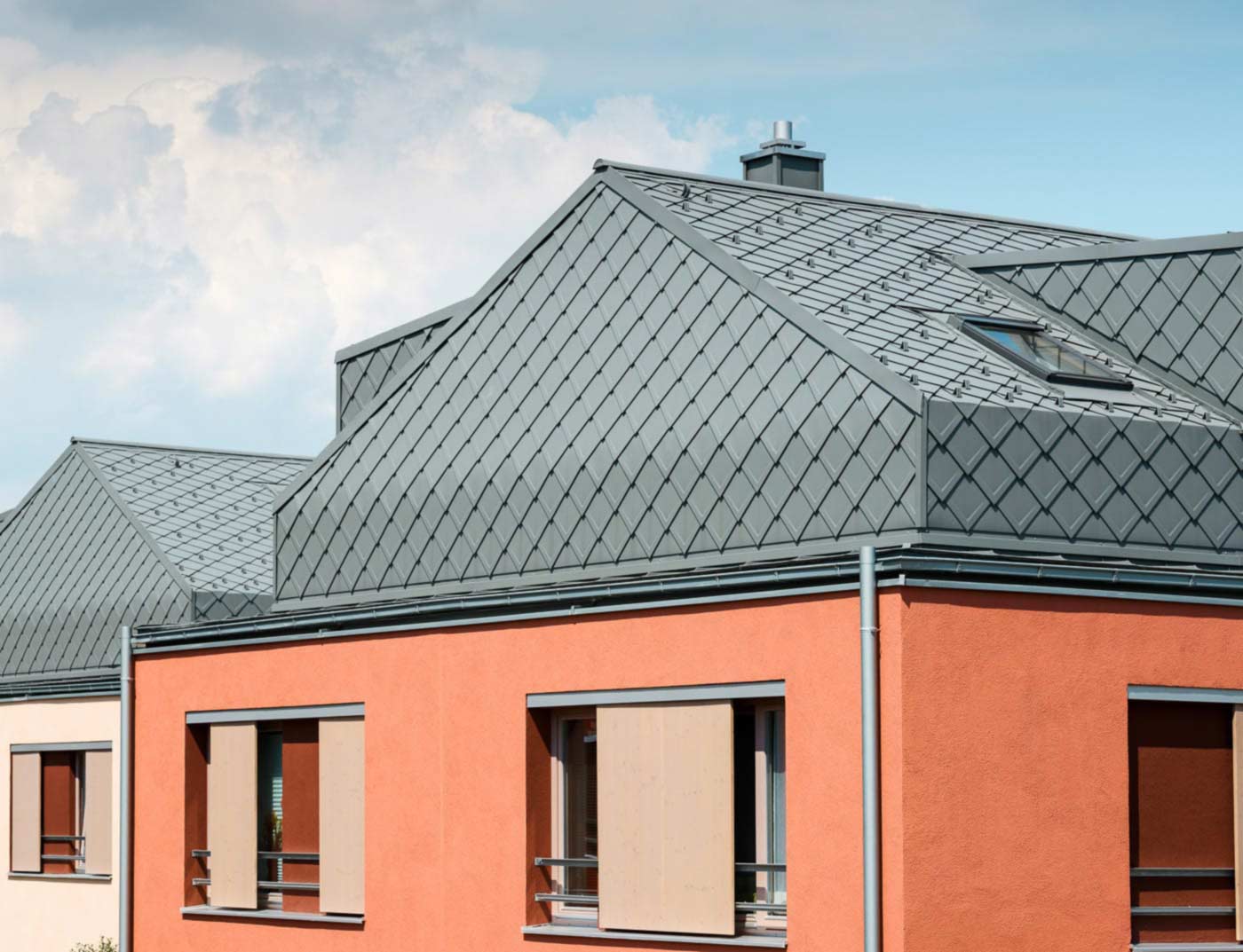Bâtiments de référence PREFA Systèmes de toits Losange de toiture 29x29 07 P.10 gris souris